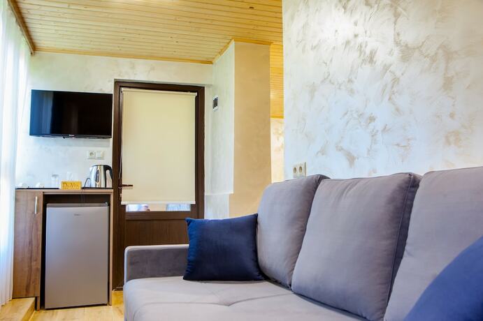 Imagen de la habitación del Hotel Dilivita Rest House. Foto 11