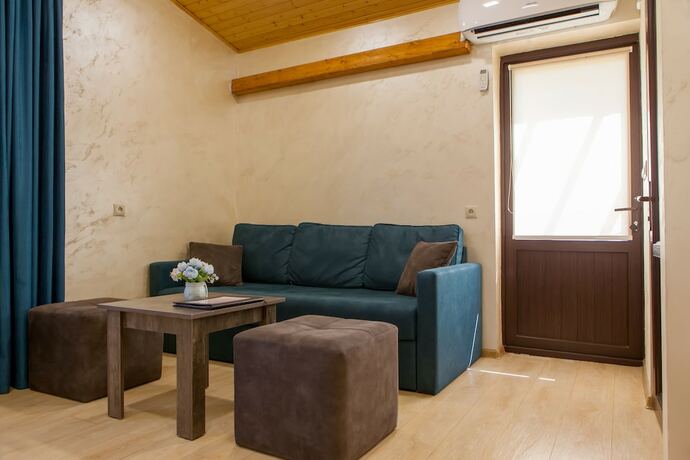 Imagen de la habitación del Hotel Dilivita Rest House. Foto 13