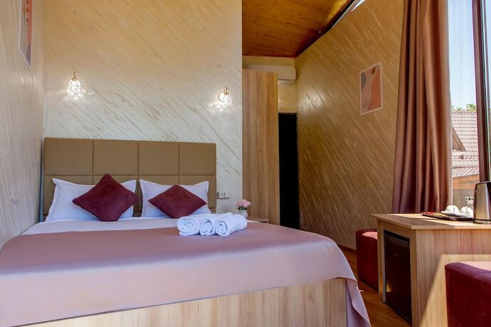 Imagen de la habitación del Hotel Dilivita Rest House. Foto 14