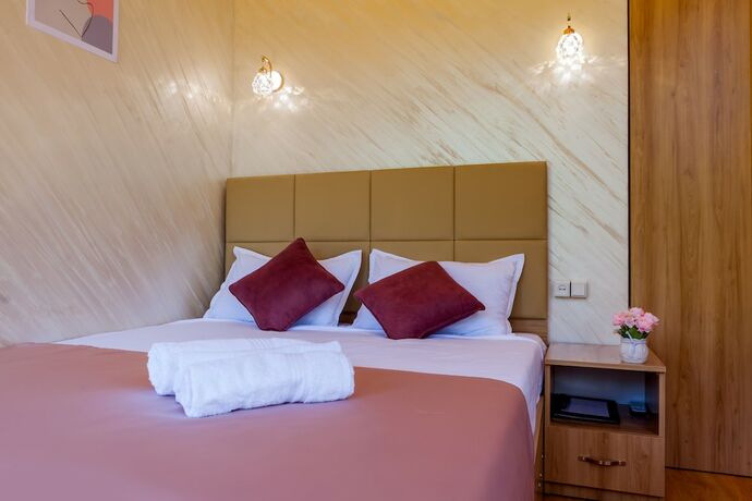 Imagen de la habitación del Hotel Dilivita Rest House. Foto 15