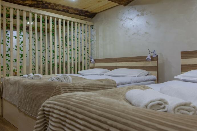 Imagen de la habitación del Hotel Dilivita Rest House. Foto 18