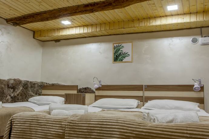 Imagen de la habitación del Hotel Dilivita Rest House. Foto 19