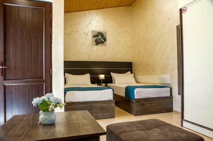 Imagen de la habitación del Hotel Dilivita Rest House. Foto 20