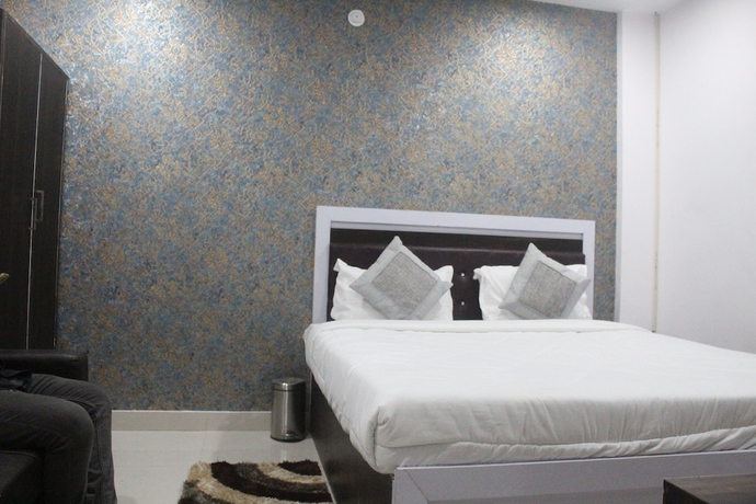 Imagen de la habitación del Hotel Dimant Inn. Foto 14