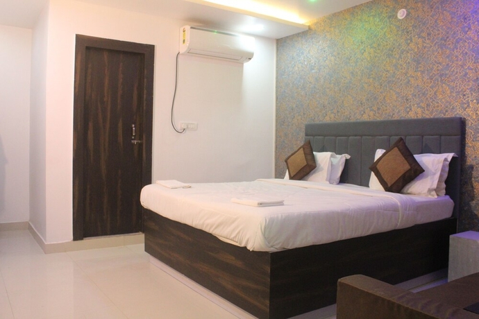 Imagen de la habitación del Hotel Dimant Inn. Foto 15