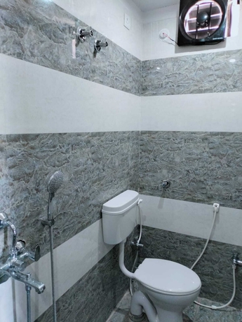 Imagen de la habitación del Hotel Dimant Inn. Foto 16