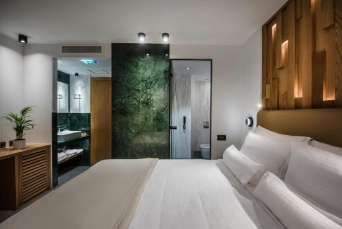 Imagen de la habitación del Hotel Dimargio Luxury Hotel and Spa. Foto 15