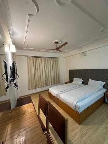 Imagen de la habitación del Hotel Dimbir Regency. Foto 4