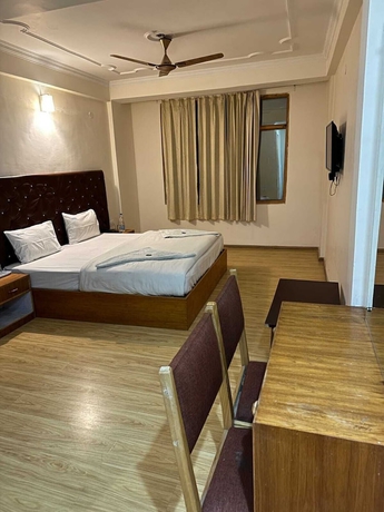 Imagen de la habitación del Hotel Dimbir Regency. Foto 7