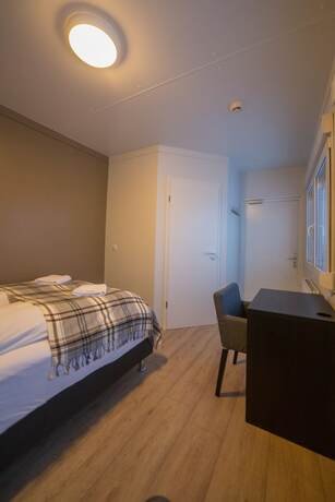 Imagen de la habitación del Hotel Dimmuborgir Guesthouse. Foto 22