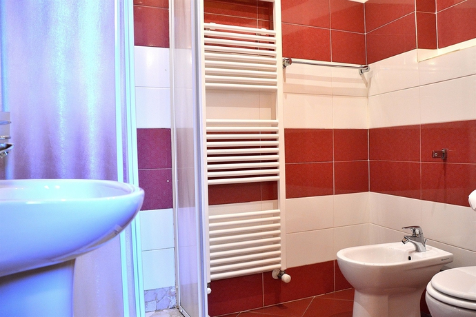 Imagen de la habitación del Hotel Dimora Dei Guelfi Luxury Rooms. Foto 5
