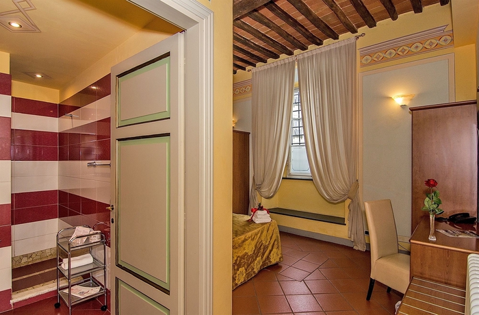 Imagen de la habitación del Hotel Dimora Dei Guelfi Luxury Rooms. Foto 6