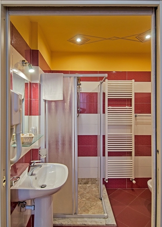 Imagen de la habitación del Hotel Dimora Dei Guelfi Luxury Rooms. Foto 7