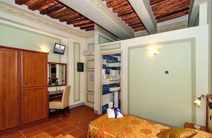 Imagen de la habitación del Hotel Dimora Dei Guelfi Luxury Rooms. Foto 8