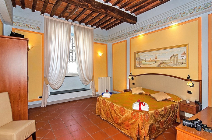 Imagen de la habitación del Hotel Dimora Dei Guelfi Luxury Rooms. Foto 9
