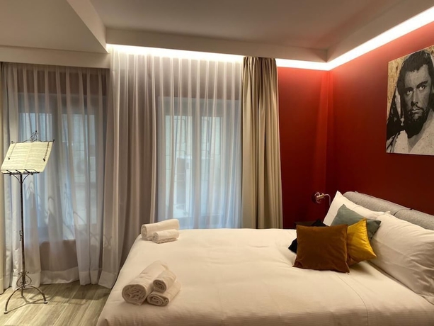 Imagen de la habitación del Hotel Dimora del teatro. Foto 9