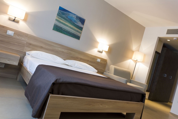 Imagen de la habitación del Hotel Dimorae. Foto 6