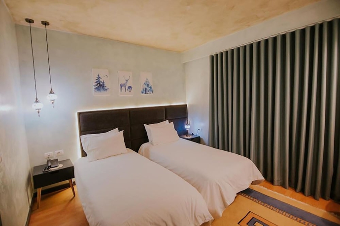 Imagen de la habitación del Hotel Dim\'s. Foto 2