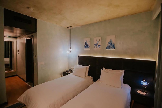 Imagen de la habitación del Hotel Dim\'s. Foto 10
