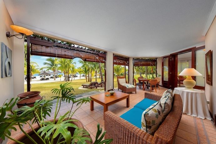 Imagen de la habitación del Hotel Dinarobin Beachcomber Golf Resort and Spa. Foto 11