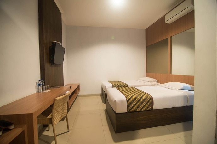 Imagen de la habitación del Hotel Dinasty Smart. Foto 8