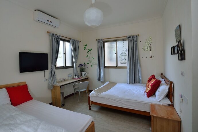 Imagen de la habitación del Hotel Ding Ding B and B. Foto 17