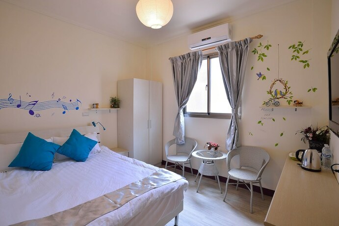 Imagen de la habitación del Hotel Ding Ding B and B. Foto 20