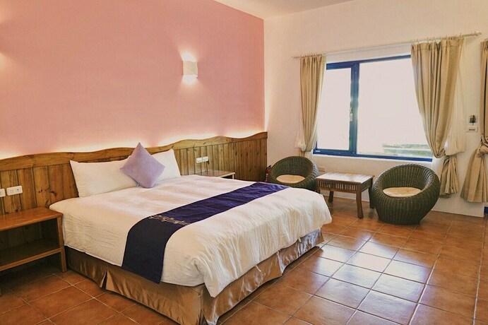 Imagen de la habitación del Hotel Ding Jia Garden Resort. Foto 17