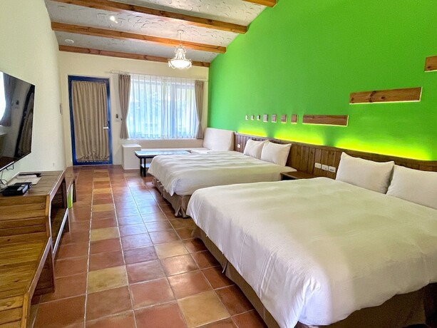 Imagen de la habitación del Hotel Ding Jia Garden Resort. Foto 19