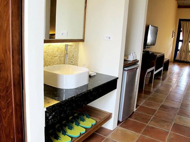 Imagen de la habitación del Hotel Ding Jia Garden Resort. Foto 22