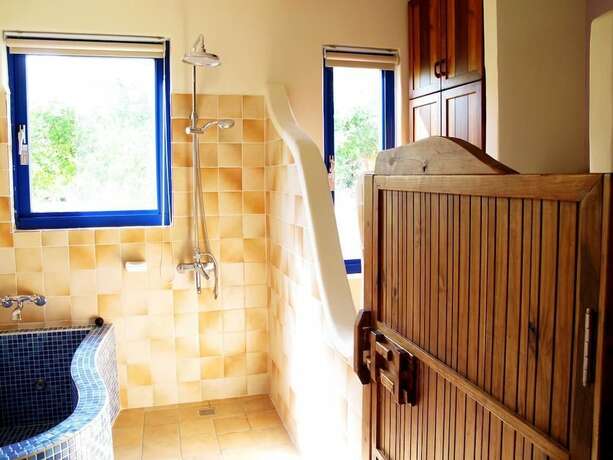 Imagen de la habitación del Hotel Ding Jia Garden Resort. Foto 25