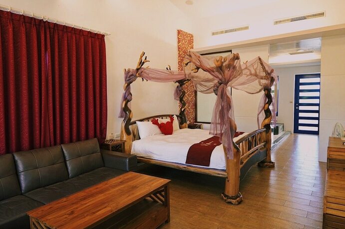 Imagen de la habitación del Hotel Ding Jia Garden Resort. Foto 32