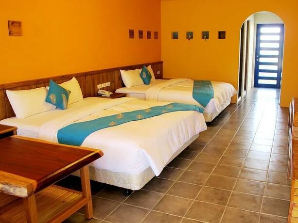 Imagen de la habitación del Hotel Ding Jia Garden Resort. Foto 33