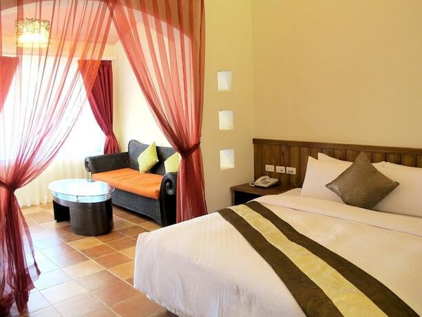 Imagen de la habitación del Hotel Ding Jia Garden Resort. Foto 34