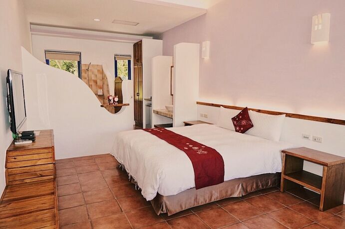 Imagen de la habitación del Hotel Ding Jia Garden Resort. Foto 35