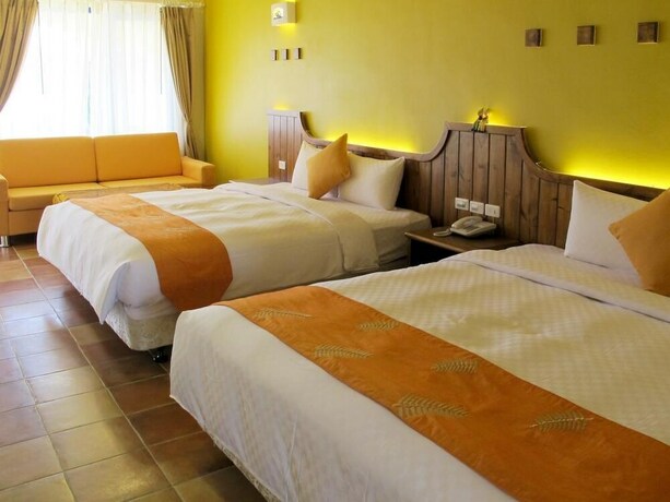 Imagen de la habitación del Hotel Ding Jia Garden Resort. Foto 36