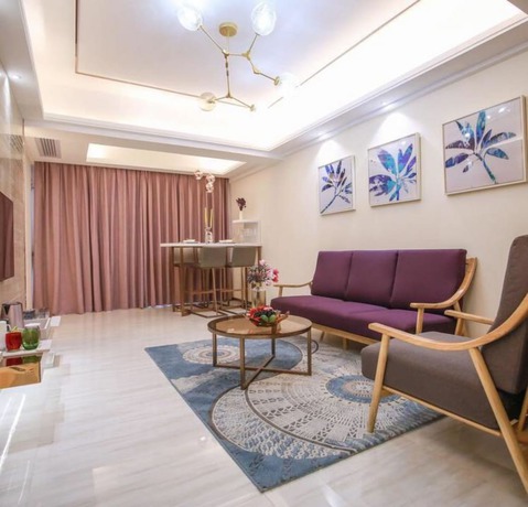 Imagen de la habitación del Hotel Ding Shang Service Apartment. Foto 2