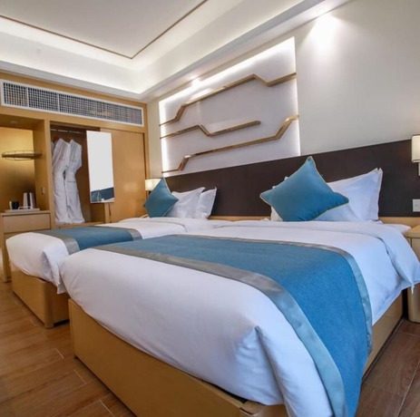 Imagen de la habitación del Hotel Ding Shang Service Apartment. Foto 6