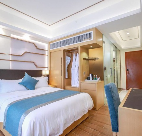 Imagen de la habitación del Hotel Ding Shang Service Apartment. Foto 9