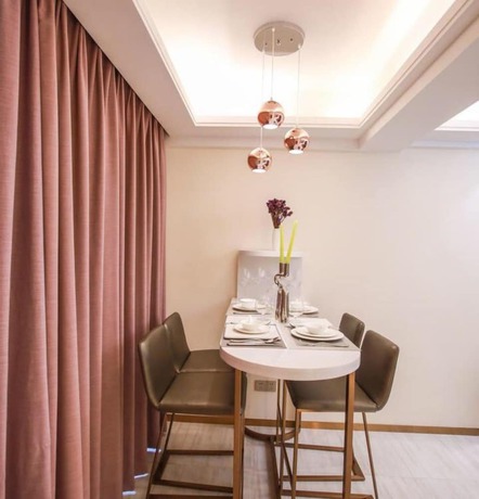 Imagen de la habitación del Hotel Ding Shang Service Apartment. Foto 10