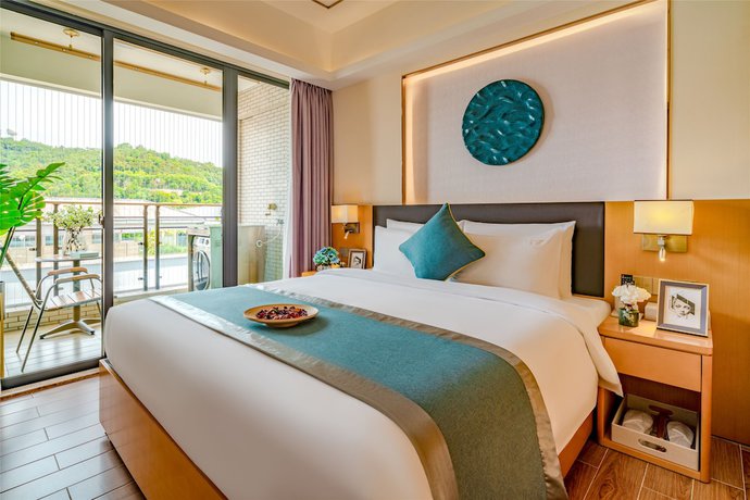 Imagen de la habitación del Hotel Ding Shang Service Apartment. Foto 13