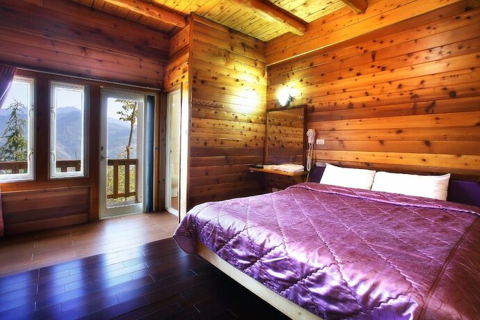 Imagen de la habitación del Hotel DingdaiGlass Villa. Foto 11