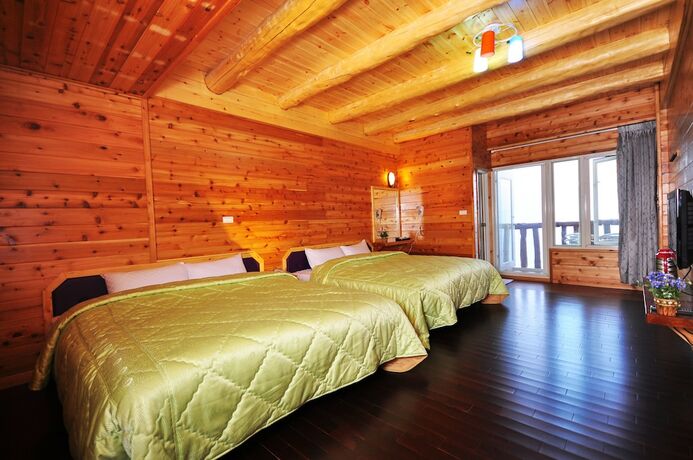 Imagen de la habitación del Hotel DingdaiGlass Villa. Foto 18