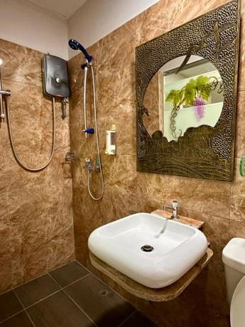 Imagen de la habitación del Hotel Dingdong Homes. Foto 17