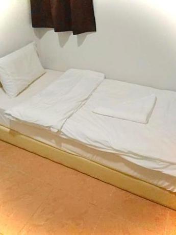 Imagen de la habitación del Hotel Dingdong Homes. Foto 20