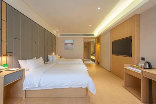 Imagen de la habitación del Hotel Dingwang - Guangzhou High Speed Rail South Railway Station Chencun Metro Station. Foto 19