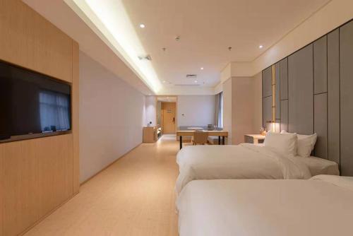 Imagen general del Hotel Dingwang - Guangzhou High Speed Rail South Railway Station Chencun Metro Station. Foto 6