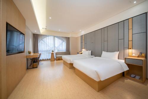 Imagen general del Hotel Dingwang - Guangzhou High Speed Rail South Railway Station Chencun Metro Station. Foto 9
