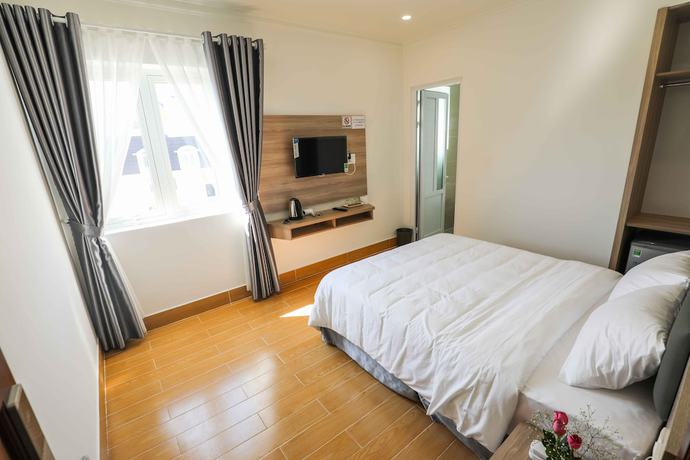 Imagen de la habitación del Hotel Dinh Cat Dalat. Foto 11