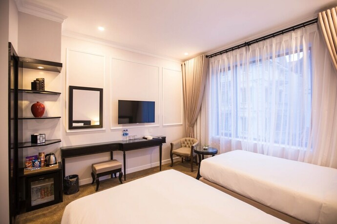 Imagen de la habitación del Hotel Dinh Elegant Hanoi. Foto 31